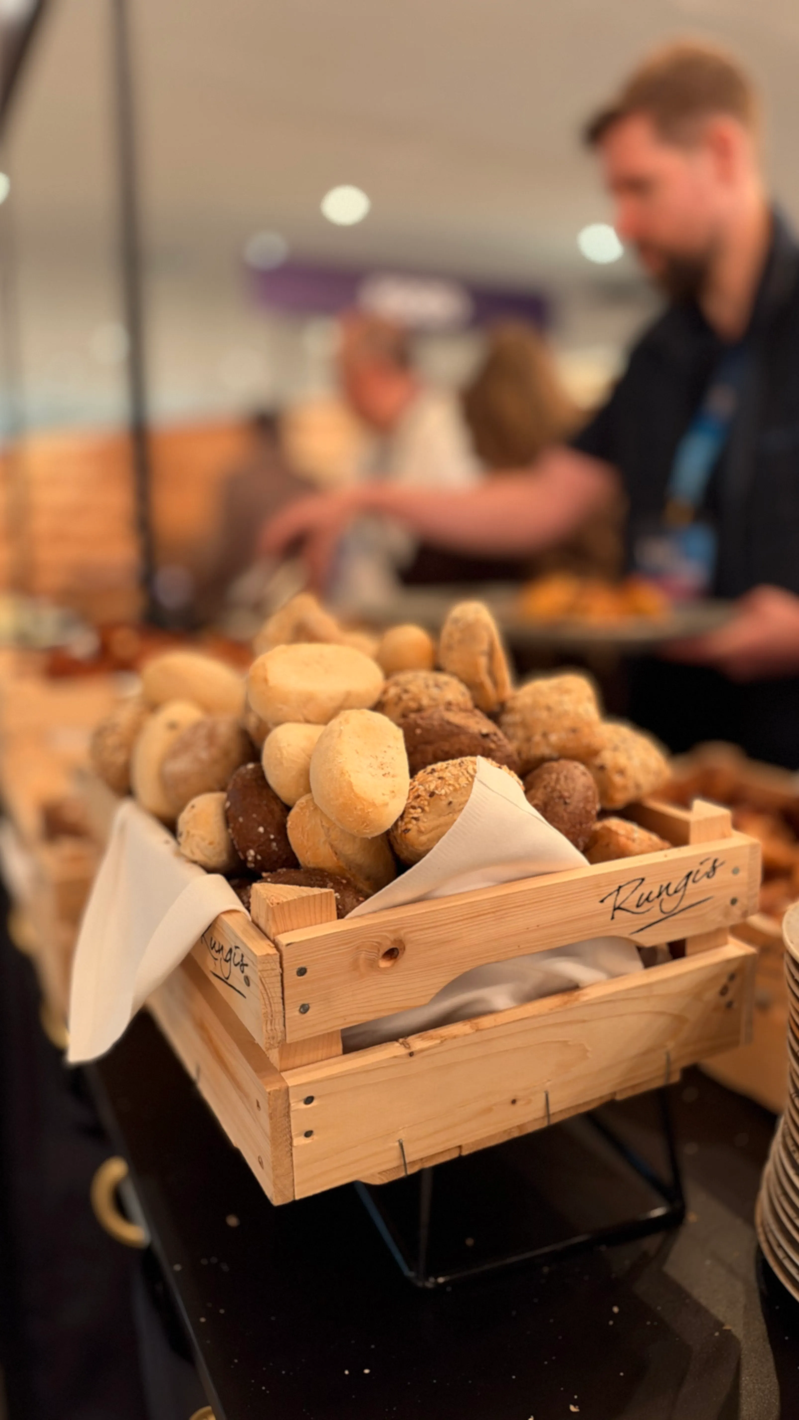 Crate of bread rolls at the breakfast buffet